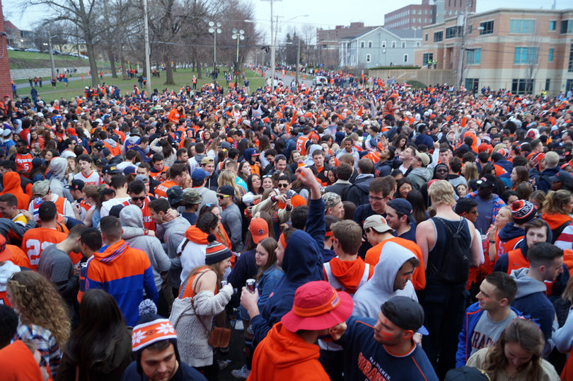 Syracuse University students party at Castle Court on Saturday.