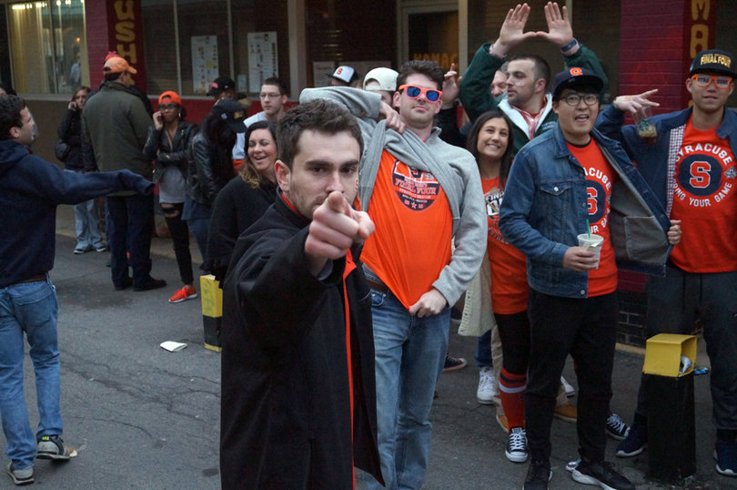 Students wait outside Chuck's Cafe on Saturday before the Final Four.