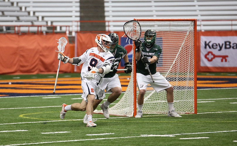 Barber curls around the crease as Binghamton's defense prepares to defend a shot. He scored a goal in the blowout.