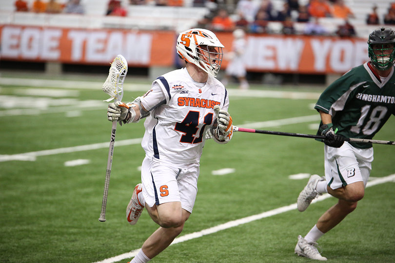 Cal Paduda cradles with just his right hand. Paduda subbed in for faceoffs late in the contest once the game was already out of reach.