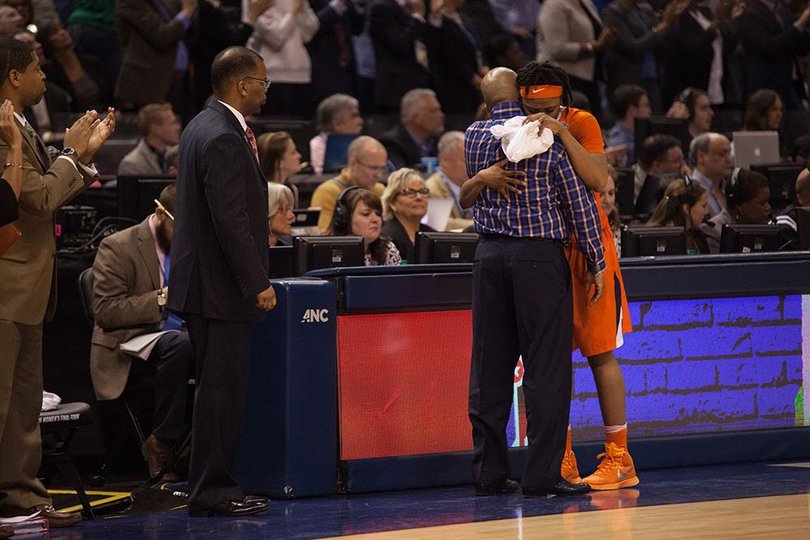 Fondren embraces Hillsman after the senior walks off the court for the last time as a member of the Syracuse team.