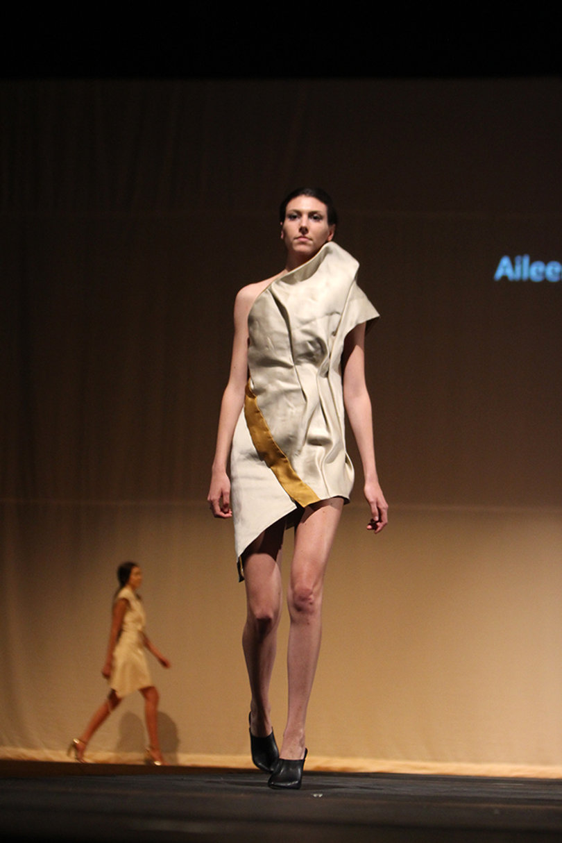 A model struts down the runway in a piece from designer Aileen Wallace's collection.