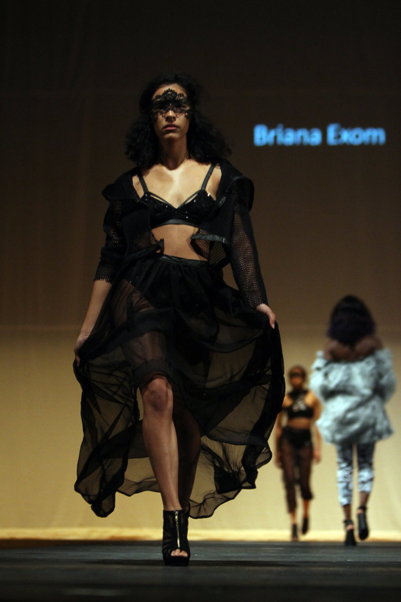A model shows some skin in this sheer ensemble by Briana Exom.