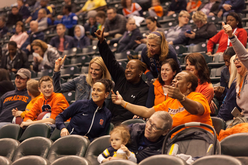 Syracuse fans cheer on the Orange from the stands at Bankers Life Fieldhouse in Indianapolis.