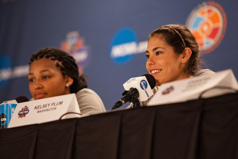 Plum speaks with the media during Washington's press conference on Saturday.