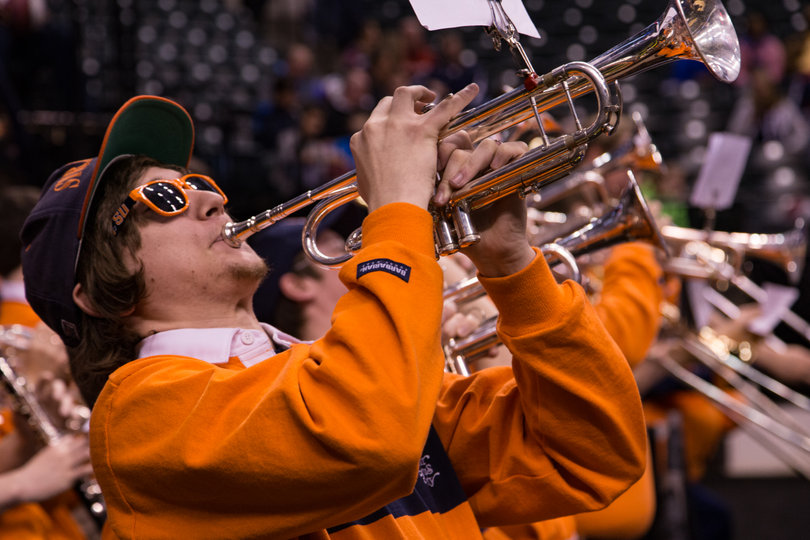 Members of the Sour Sitrus Society play during Syracuse's open practice on Saturday.