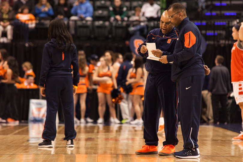 Syracuse head coach Quentin HIllsman talks with associate head coach Vonn Read at the start of the Orange's practice.