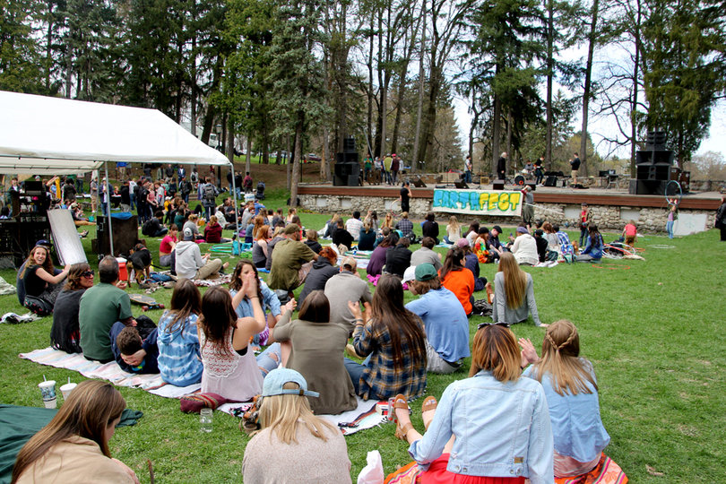 Students and members of the Syracuse community cheer on the local bands that performed at Earthfest on Sunday.