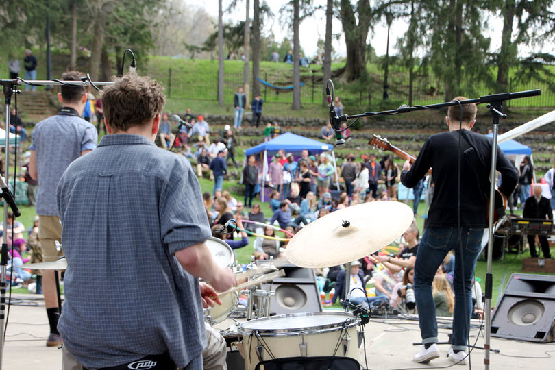 Members of Pizza Party Jesse Katzenstein (left), Eric Zidar (center) and Will Skalmoski (right) perform along with Will Taggart at Earthfest.