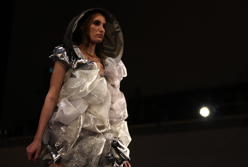 Designer Alex Summers mixed guazy and metallic fabrics to create this look.