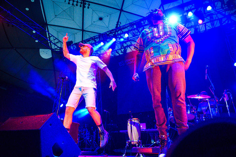 Jon Bellion brings a whole crew of backup singers and musicians onstage with him.