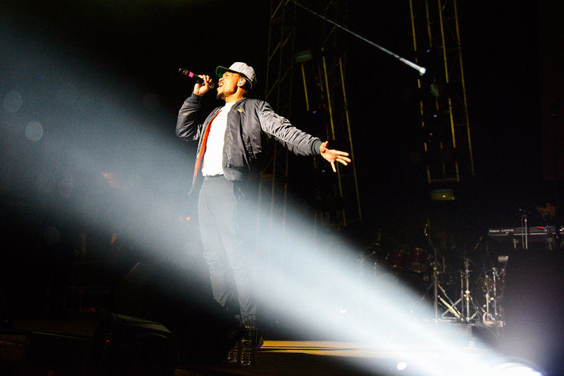 Chance The Rapper takes in the crowd's cheers as he raps his biggest hits.