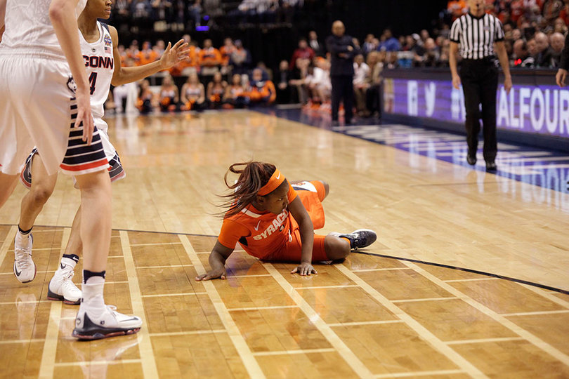 Alexis Peterson, sprawled on the floor, shot 0-for-6 behind the 3-point arc.
