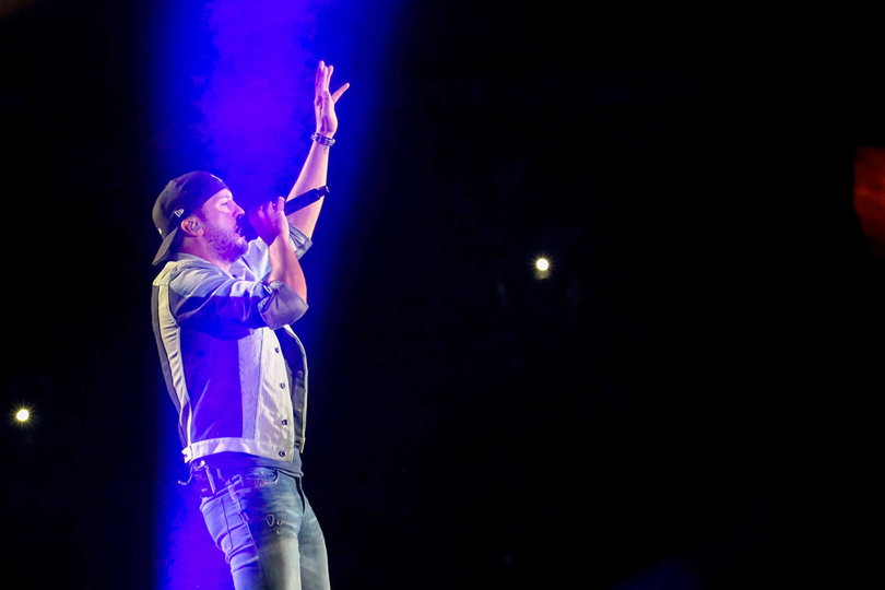 Bryan started the show by running out onstage, quickly ditching his denim jacket after just a few songs.