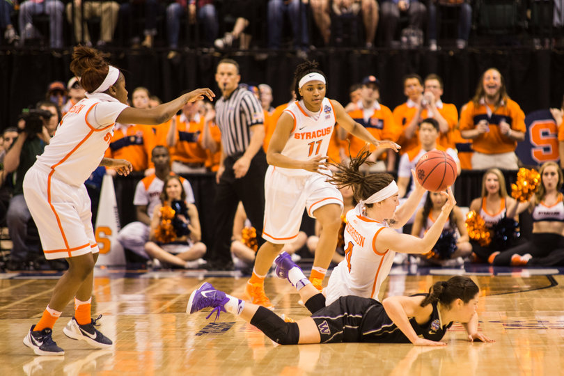 Maggie Morrison (4) dives for a loose ball past Washington's Kelsey Plum. Her defense was a big reason why the nations third-leading scorer only had shot 28 percent. 