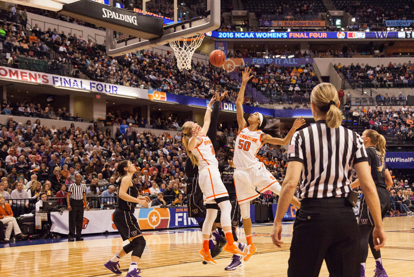 Briana Day (50) leaps up to try and snag a rebound. She had a game-high 15