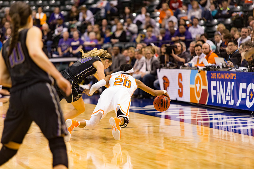 Sykes lays out to try and corral a loose ball