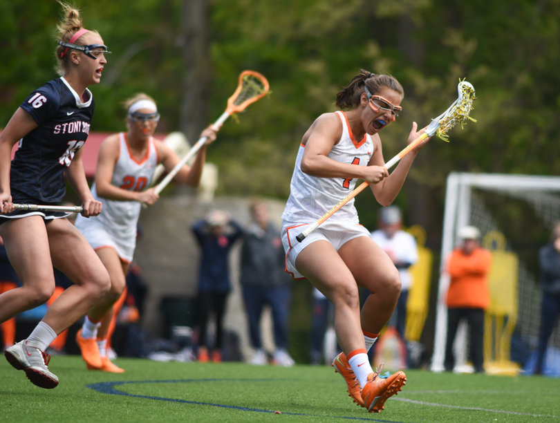 Bodt pulls up abruptly while Stony Brook's Alyssa Fleming guards her. The SU senior has been one of the Orange's most consistent midfielders and has scored 20 goals this season. 