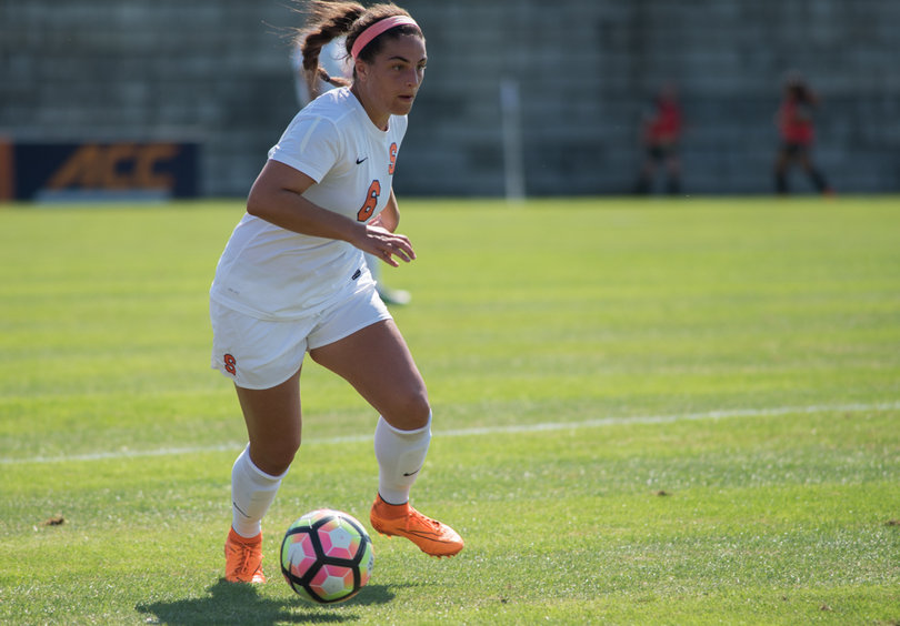 Defender Natasha Tcheki-Jamgotchian pushes the ball upfield. Syracuse handed Army its third loss to start the season.
