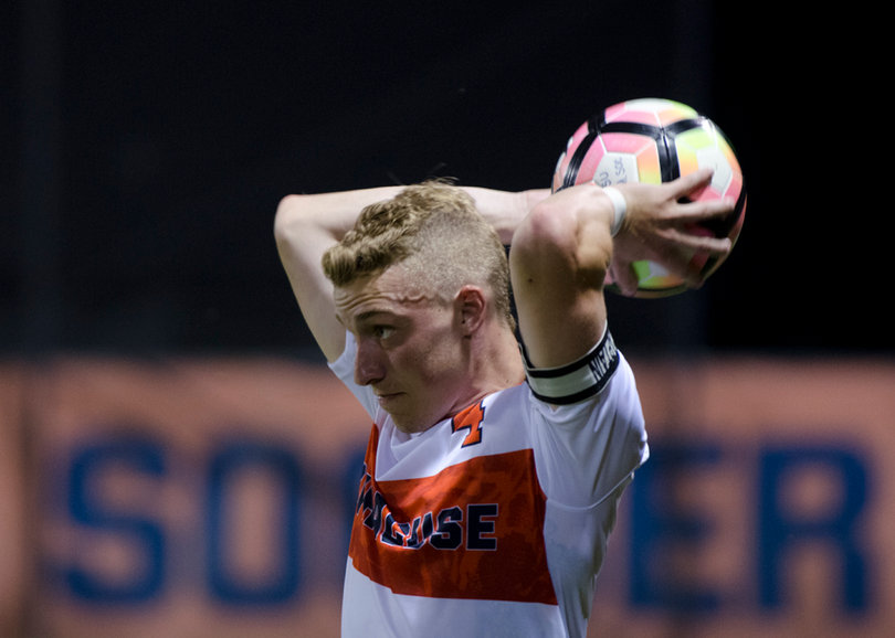 Senior captain Liam Callahan looks forward as he prepares to take a throw-in.
