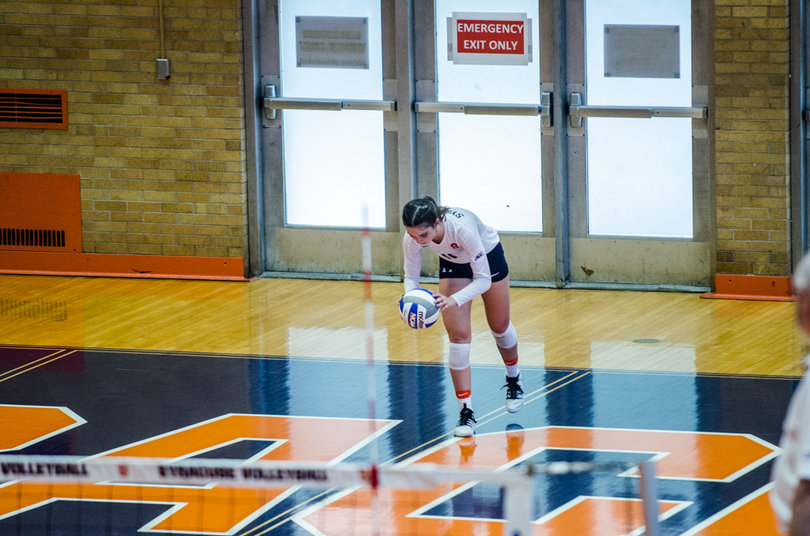 Belle Sand dribbles the ball before serving. She had two aces on the day.