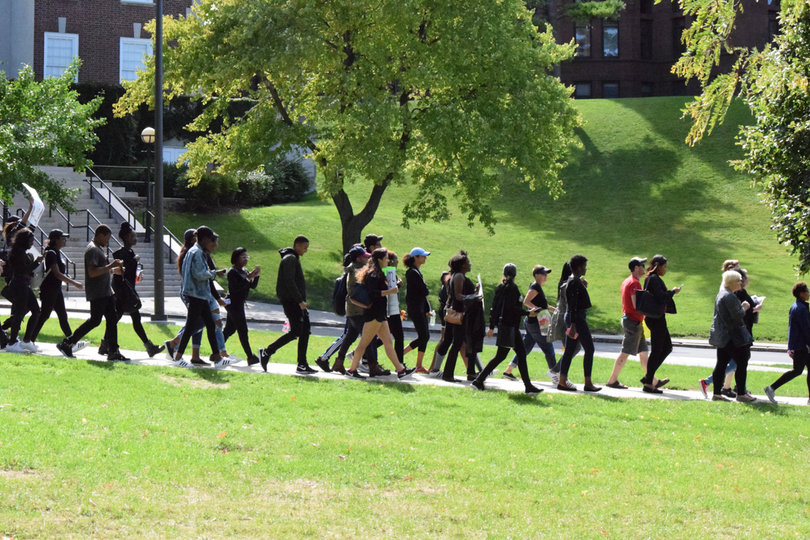 SU students raising their voices against police brutality start their march down to the University Place promenade.