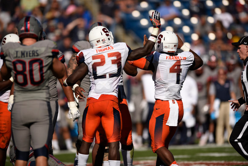 Juniors Jonathan Thomas (left) and Zaire Franklin had five and seven tackles, respectively. 