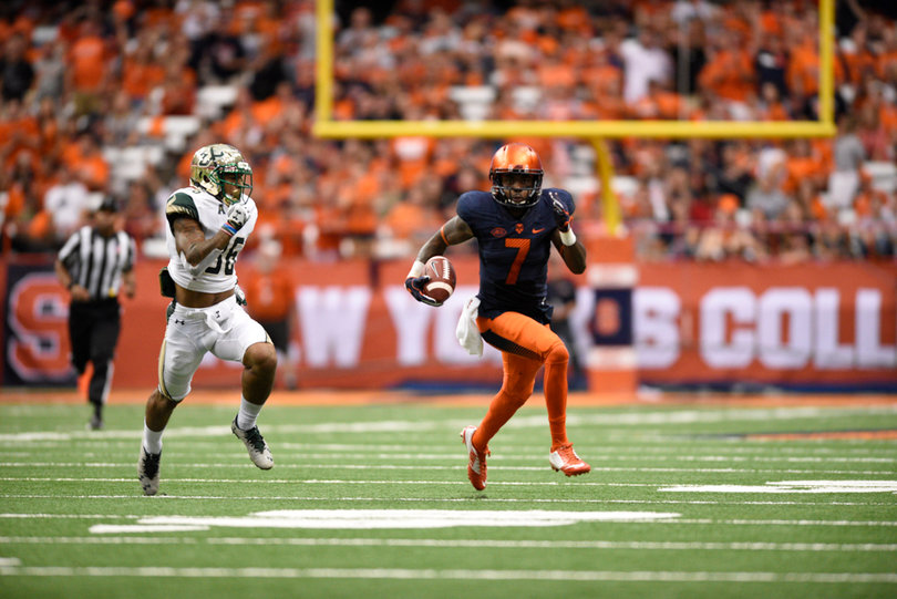 Etta-Tawo finds space on the outside of the field and uses his speed to beat his defender.