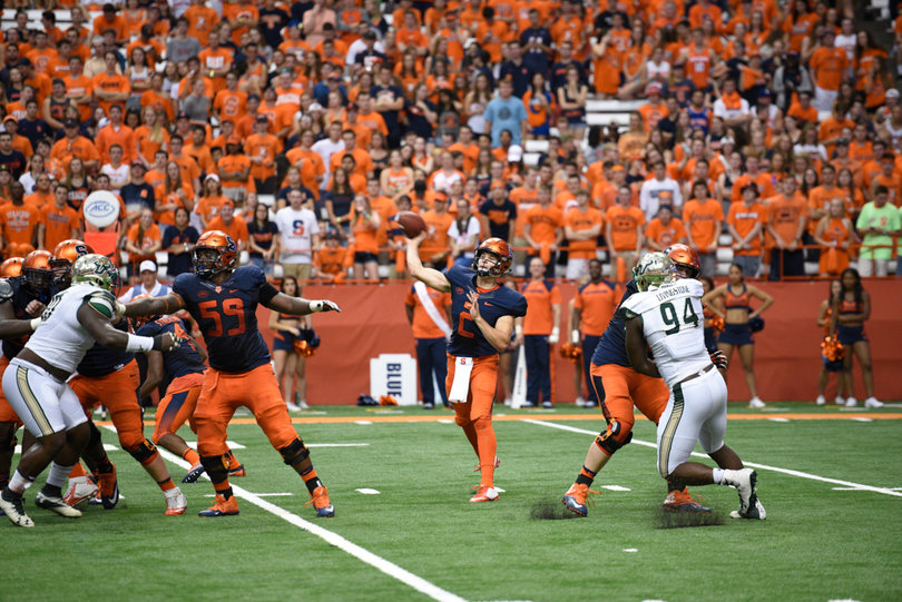 Dungey unloads a pass in front of an attentive crowd. He threw for 350 yards in the contest.