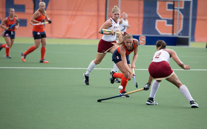 Jennifer Bleakney tries to win a ball back from BC.