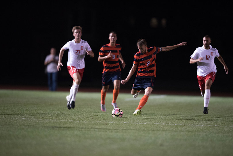 SU midfielder Oyvind Alseth sends a ball downfield. He recorded an assist in the game.