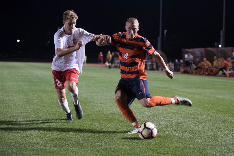 Liam Callahan cocks back his leg to send a crossing pass toward Cornell's penalty area.