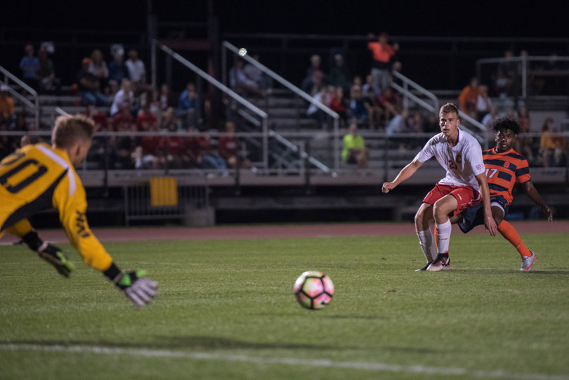 The Big Red goalie dives for a ball.