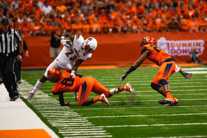 Antwan Cordy (8) makes a tackle near the sideline. He left the game with swelling in his wrist. 