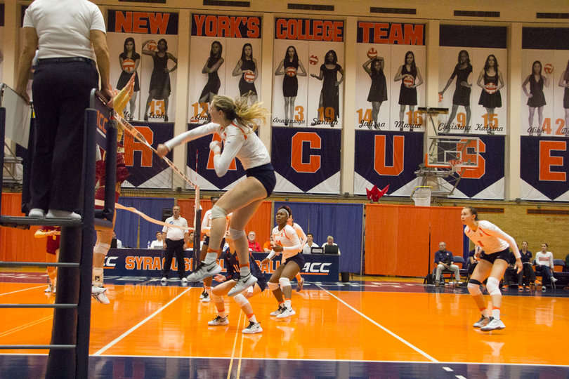 A Syracuse player goes for a spike against the Eagles. SU won several points via the spike.