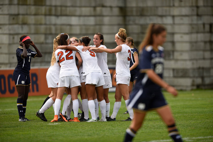 Syracuse players celebrate after Eva Gordon's goal. It was the only SU goal in the game as the Orange tied UND, 1-1.