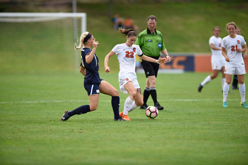 Stephanie Skilton pokes the ball past a Notre Dame defender.