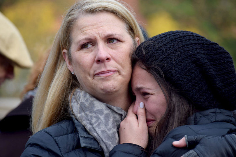 Joanne O’Brien hugs her daughter, Grace Rietta, following the Rose Laying Ceremony at the conclusion of Syracuse University’s Remembrance Week 2016. Joanne was friends with Nicole Boulanger, one of the 35 SU students who died in the Pan Am Flight 103 bombing. “I thought it was beautiful,” Joanne said, referencing her first time at SU for the Rose Laying Ceremony. “It’s still a huge loss.”
