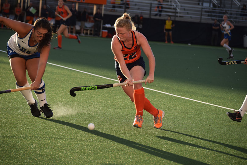 Carey navigates the ball through the Duke defense. 