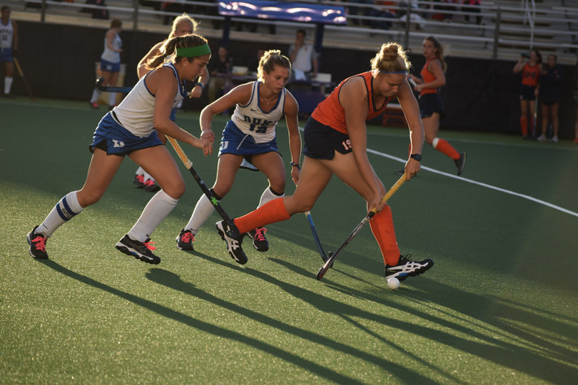 Syracuse's Annalena Ulbrich tries to keep the ball away from two closing Duke defenders. 