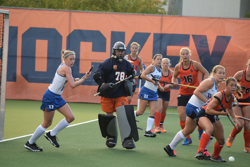 Goalie Regan Spencer looks on as SU clears the ball. Spencer had five saves. 