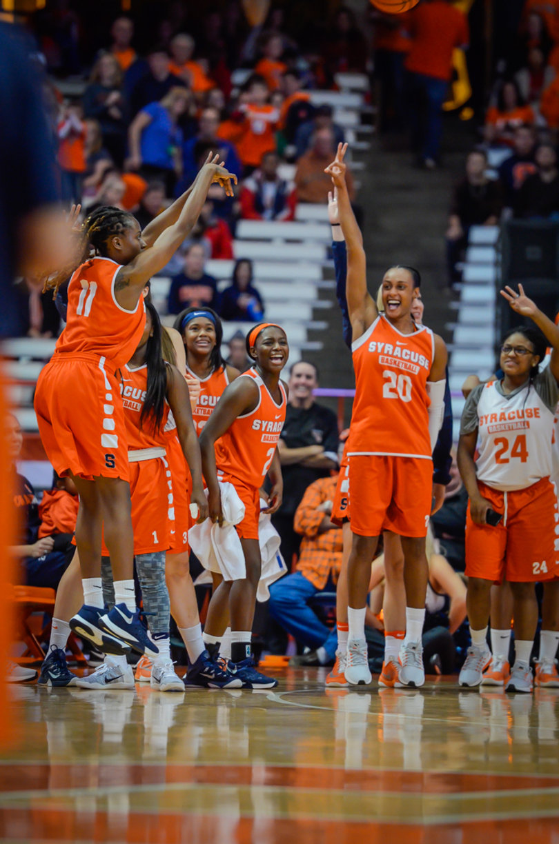 Brittney Sykes (20) cheers on Alexis Peterson in the 3-point contest.