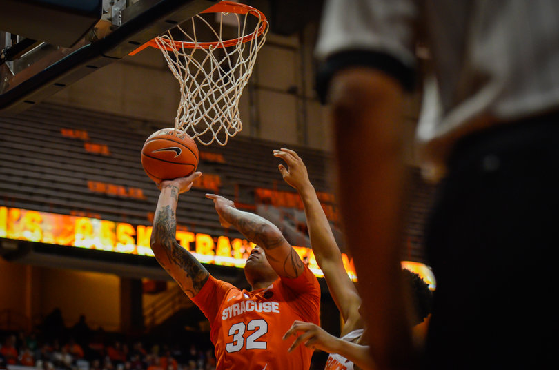 Coleman goes up for a layup in the scrimmage during Orange Madness. 