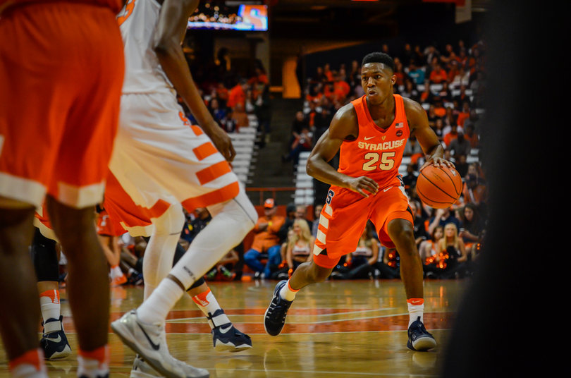 Battle looks to pass or shoot from the wing. 