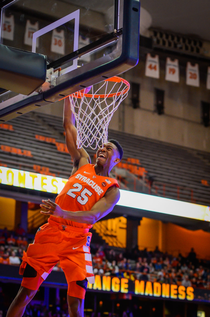 Battle goes up for a dunk.