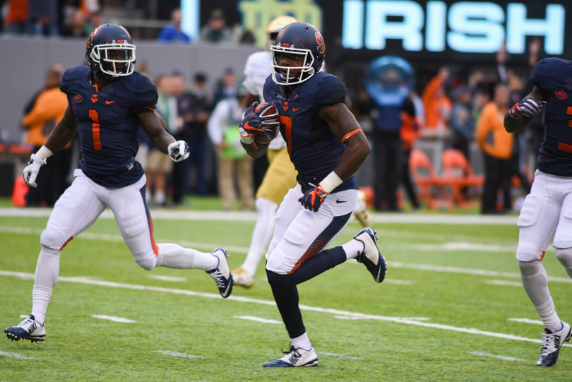 Syracuse receiver Amba Etta-Tawo runs toward the end zone with teammates around to help block. He recorded his fifth straight 100-yard receiving game with 134 yards on Saturday.