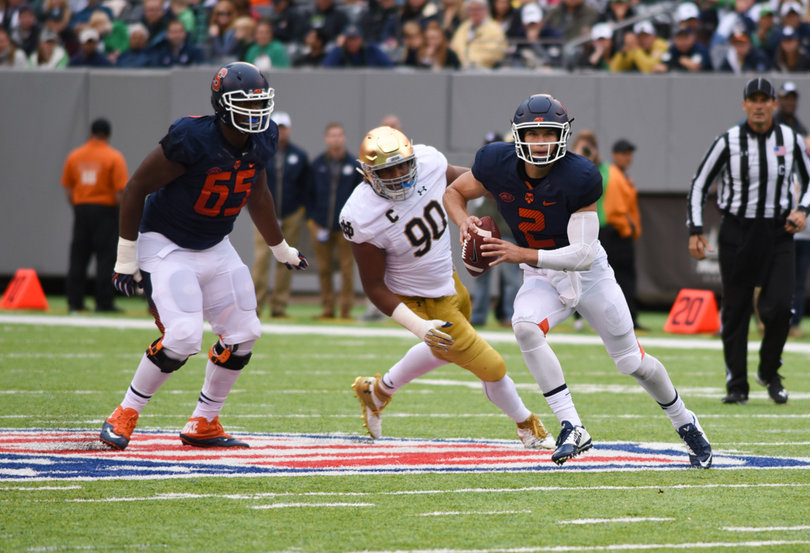 Eric Dungey scrambles out of the pocket. He was sacked just once.
