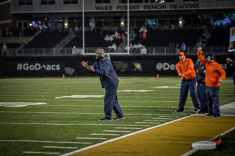 SU head coach Dino Babers calls out directions to his players on the field. The Orange is 2-4 in Babers' first year as head coach.