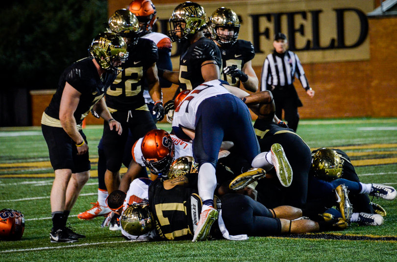 A pile-up breaks out during Syracuse's game against Wake Forest.