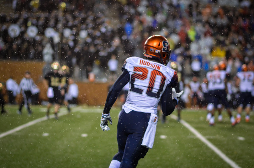 Syracuse cornerback Cordell Hudson watches the ball from the opposite side of the field.